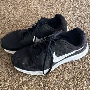 Nike black and white running shoes size 8.5